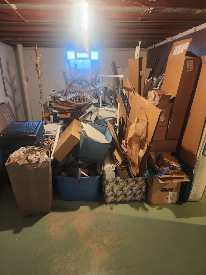 Roll-off dumpster container at job site for 20 Yard Dumpster Rental in Pine Level